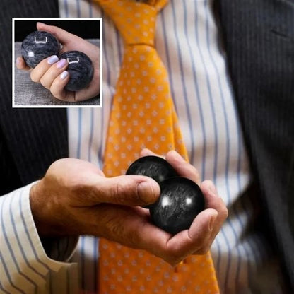 main avec boule de massage noir fond cravate jaune