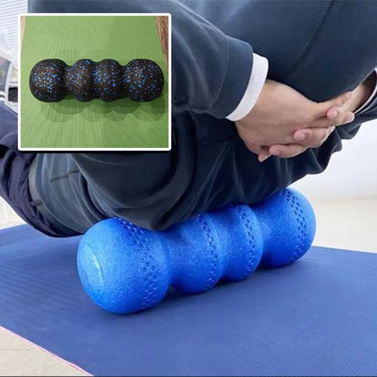 homme alonge sur rouleau de massage bleu sur tapis bleu