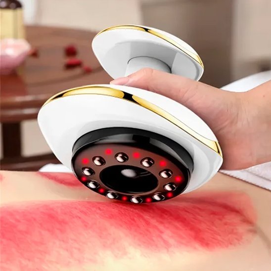 main sur appareil massage blanc sur dos rouge dans un salon  de massage