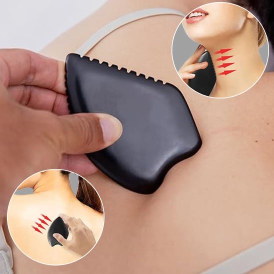 main sur pierre gua sha sur le dos  