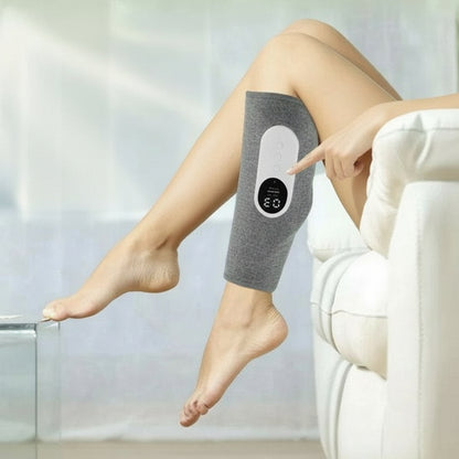 pressothérapie pour les jambe sur table verre sofa blanc fenêtre flou