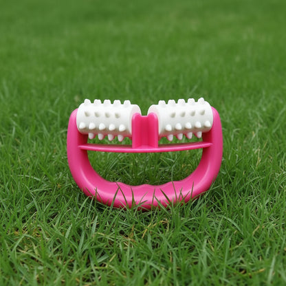 rouleaux de massage rouge sur la pelouse verte