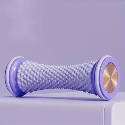 rouleau de massage violet sur fond violet
