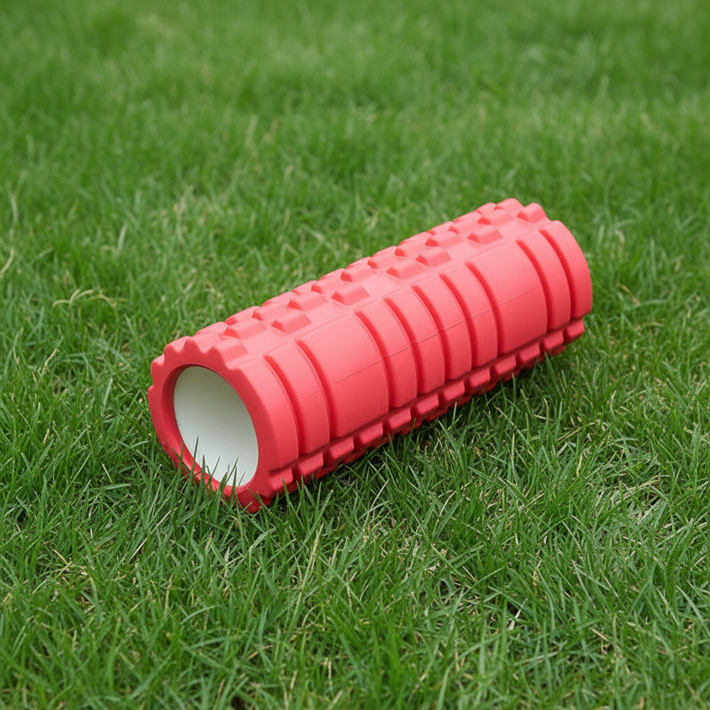 rouleau massage dos sur pelouse verte