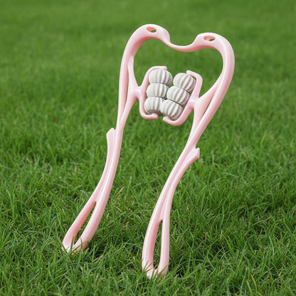 rouleaux de massage sur une pelouse verte