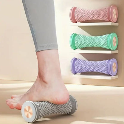 trois rouleau de massage sur etagere un desous pied